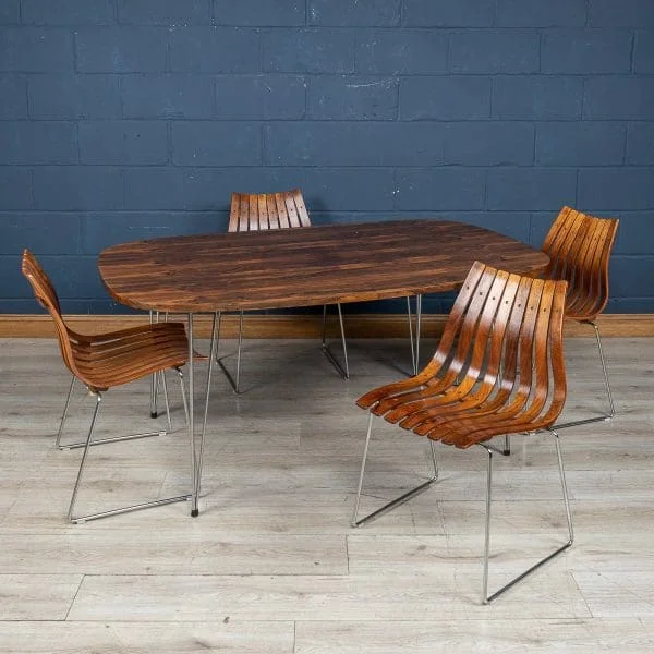 A Rosewood Dining Table and Chairs by Hans Brattrud for Hove Mobler, Norway, 1960s