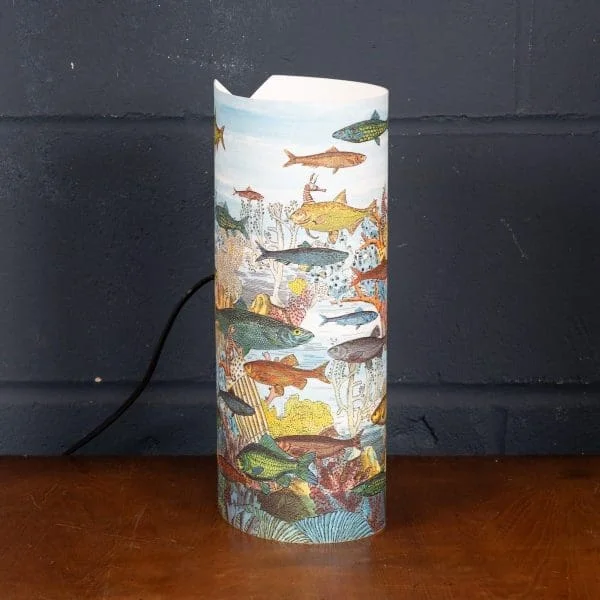 A Fornasetti table lamp with swimming Fish