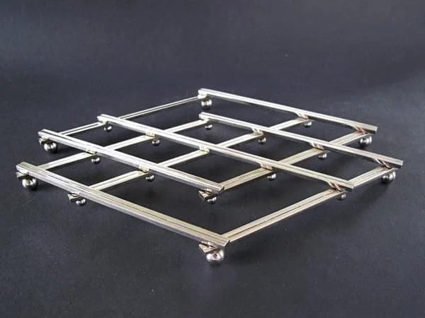 French Folding Steel Trivet by Jacques Adnet