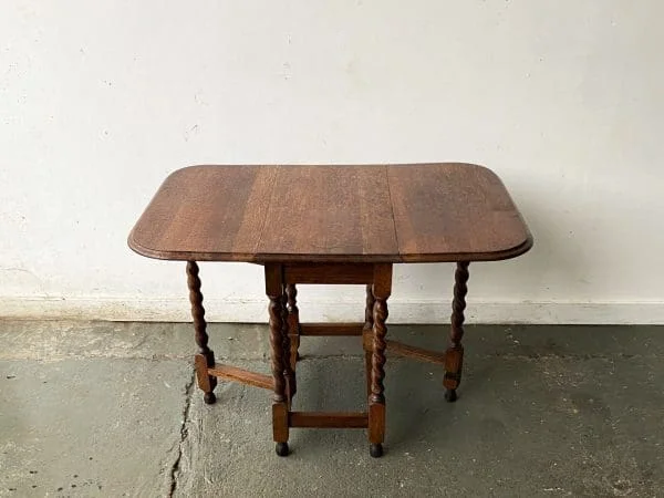 Late 19th century solid oak barley twist drop leaf table